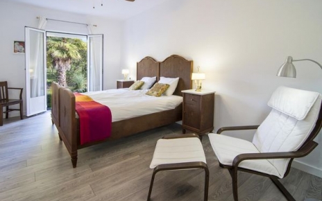 Bedrooms with doors opening to gardens